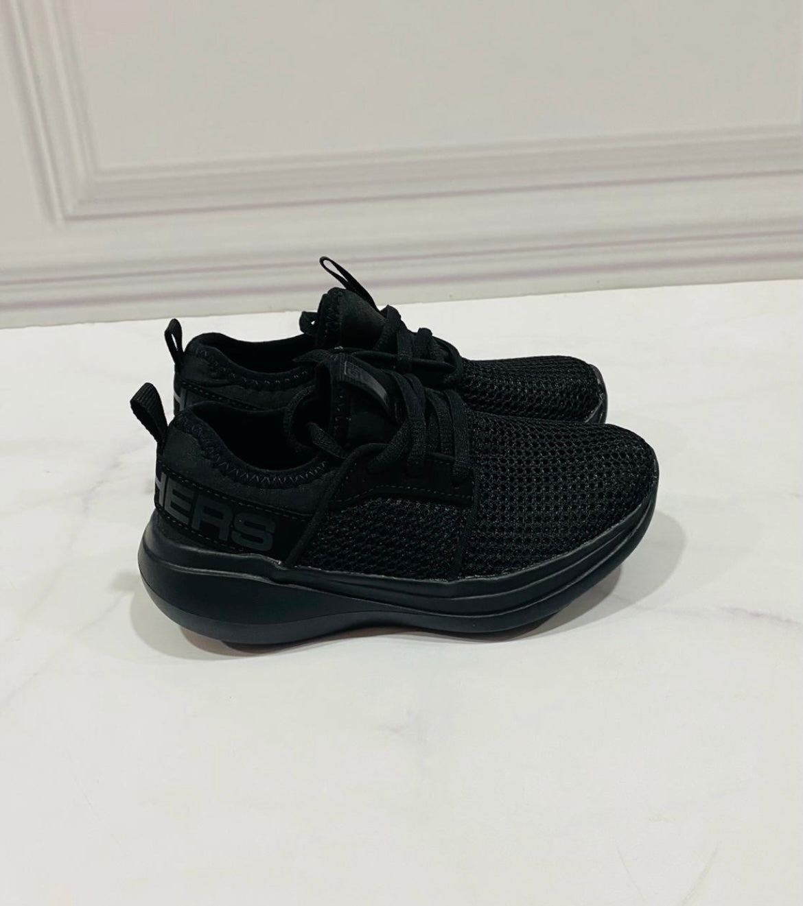 Skechers niña negro deals