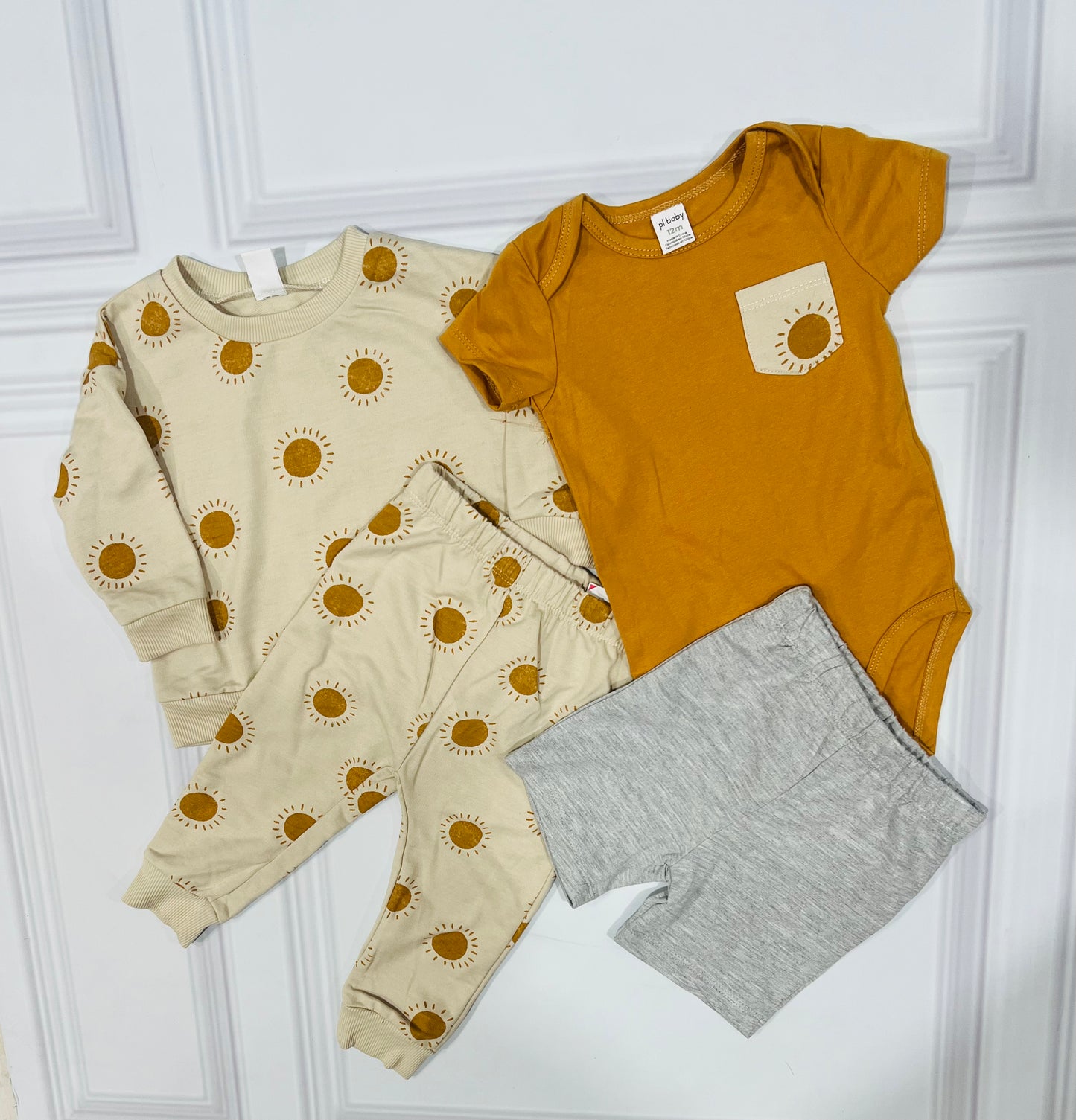 Set 4 piezas bebe niño amarillo sol