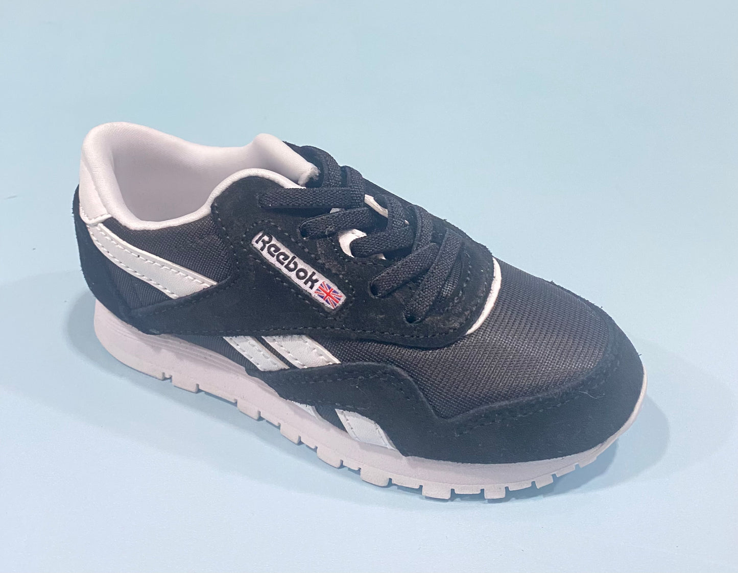 Tenis negros reebok unisex niña niño