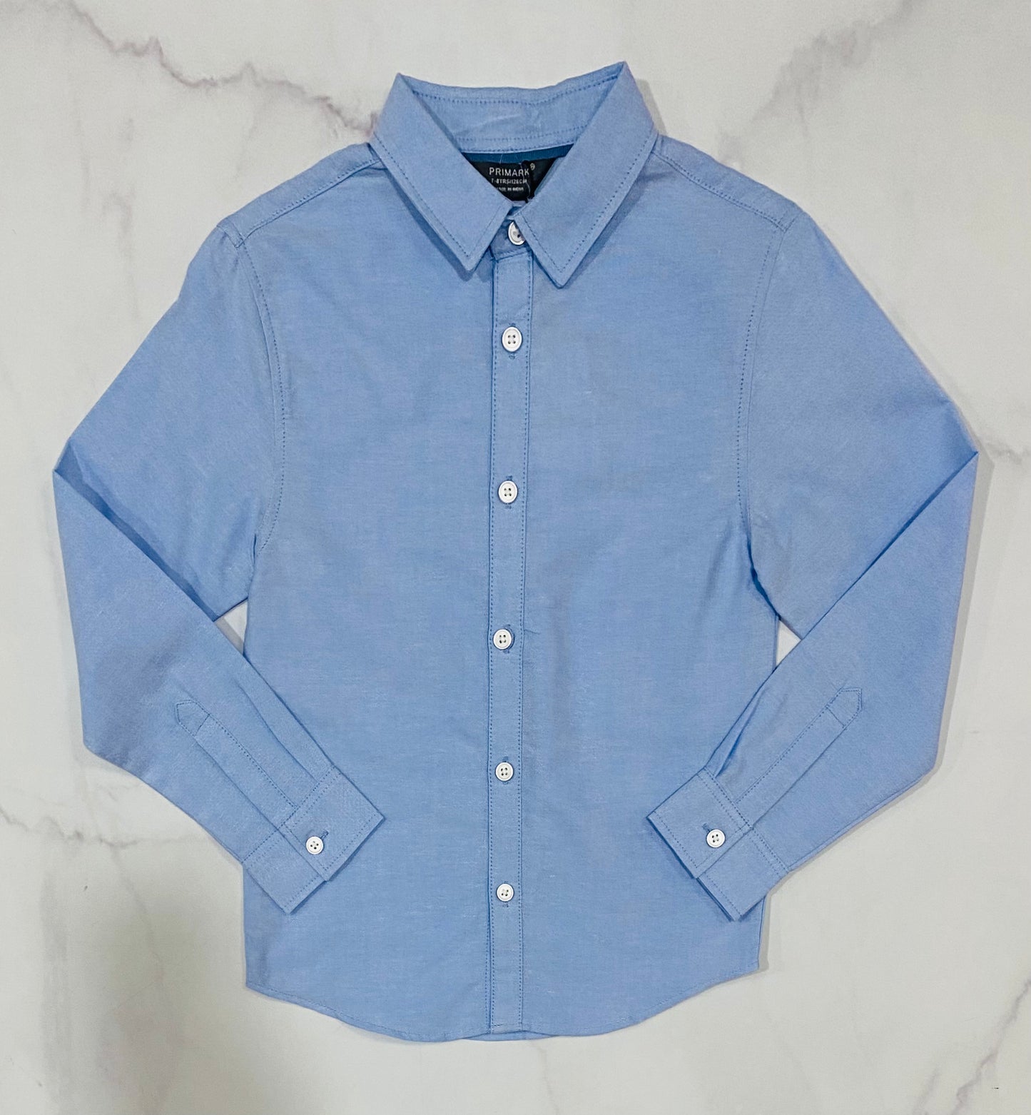 Camisa azul manga larga formal Niño primark