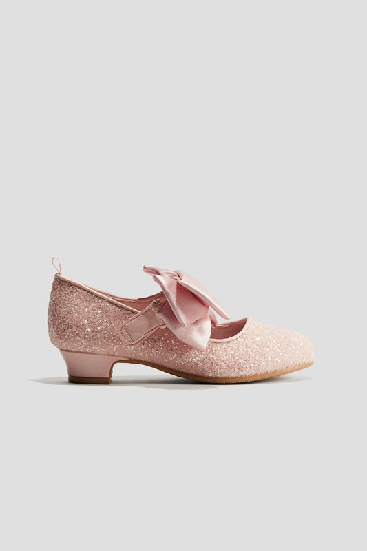 Zapatillas tacon rosadas chongo   H&M niña