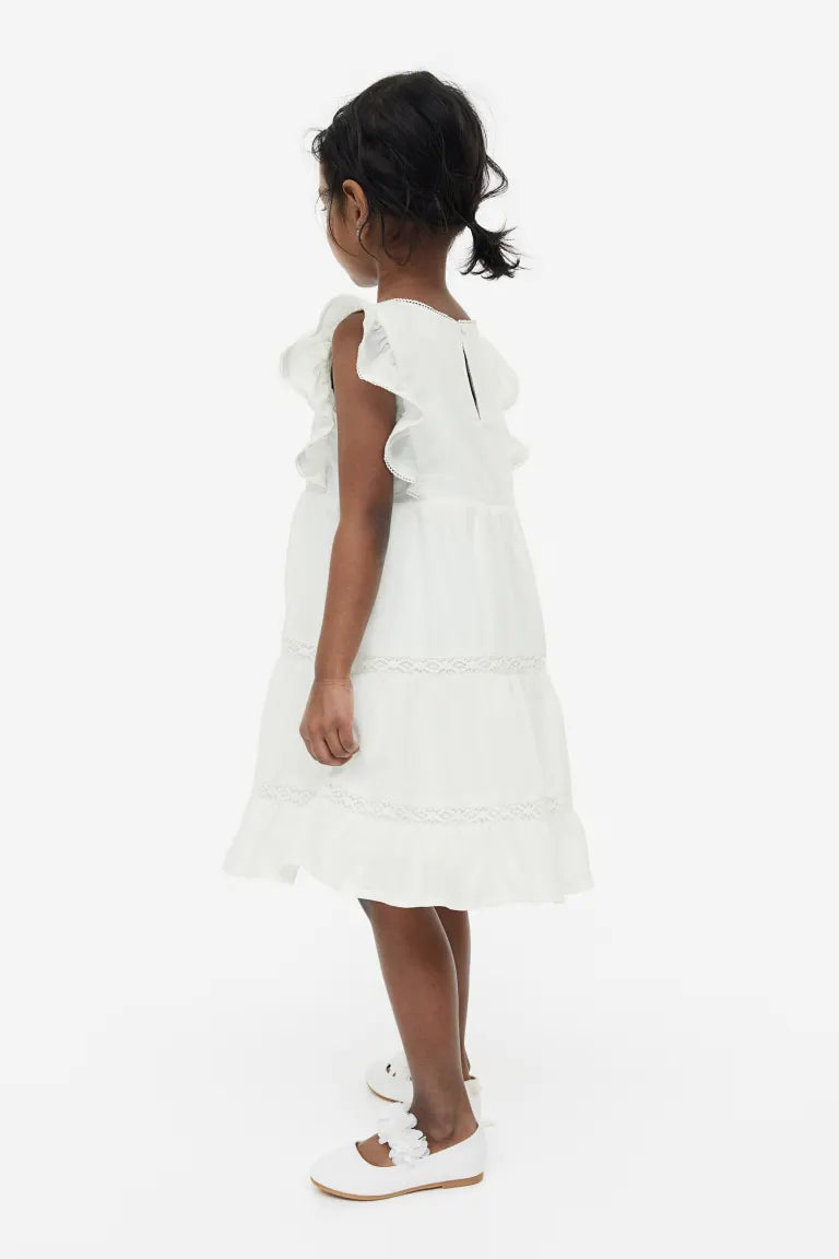 Vestido blanco encaje fino niña H&M