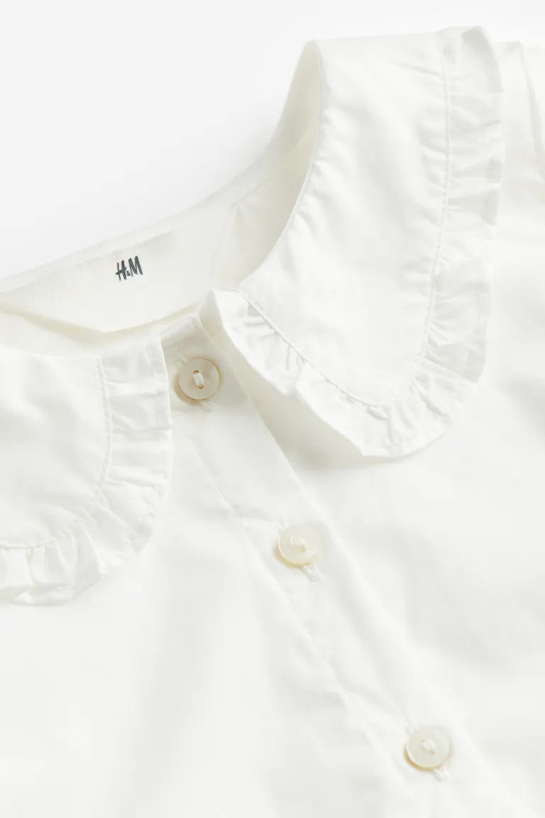 Camisa blanca niña H&M revuelos blusa manga larga