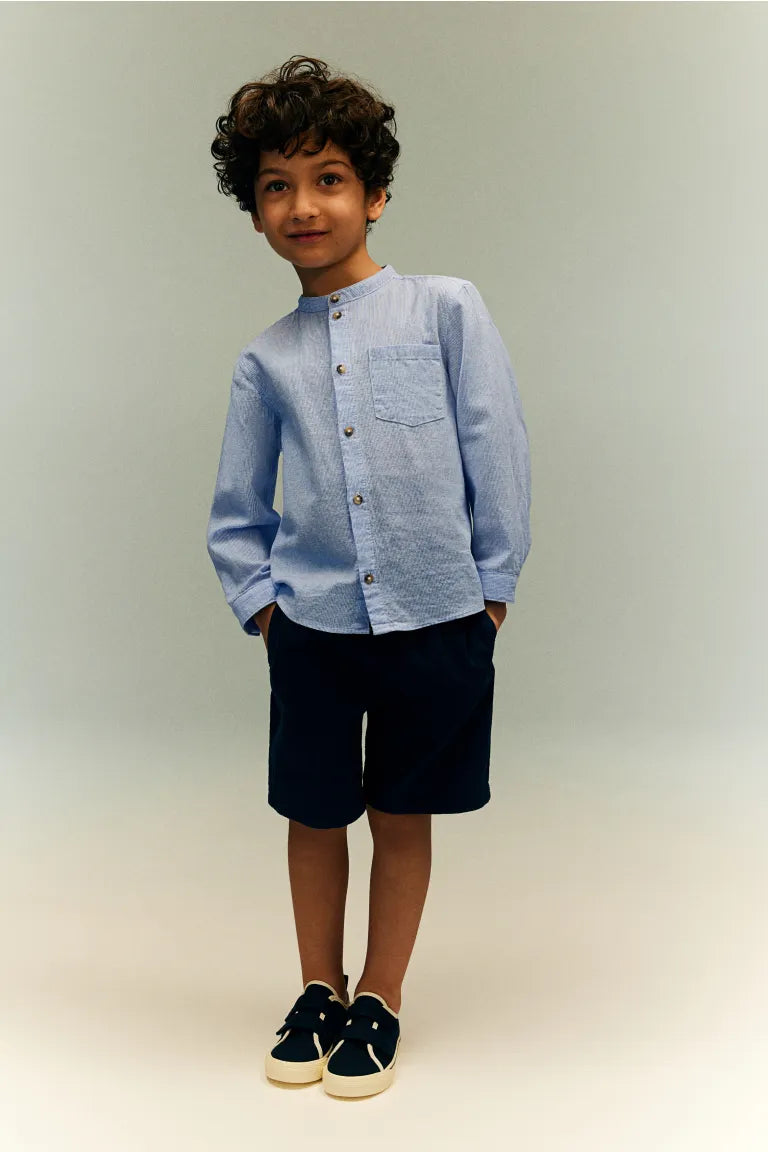 Camisa formal azul celeste claro niño henley H&M