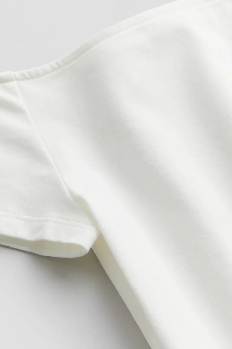 Camisa blanca shoulder off niña H&M