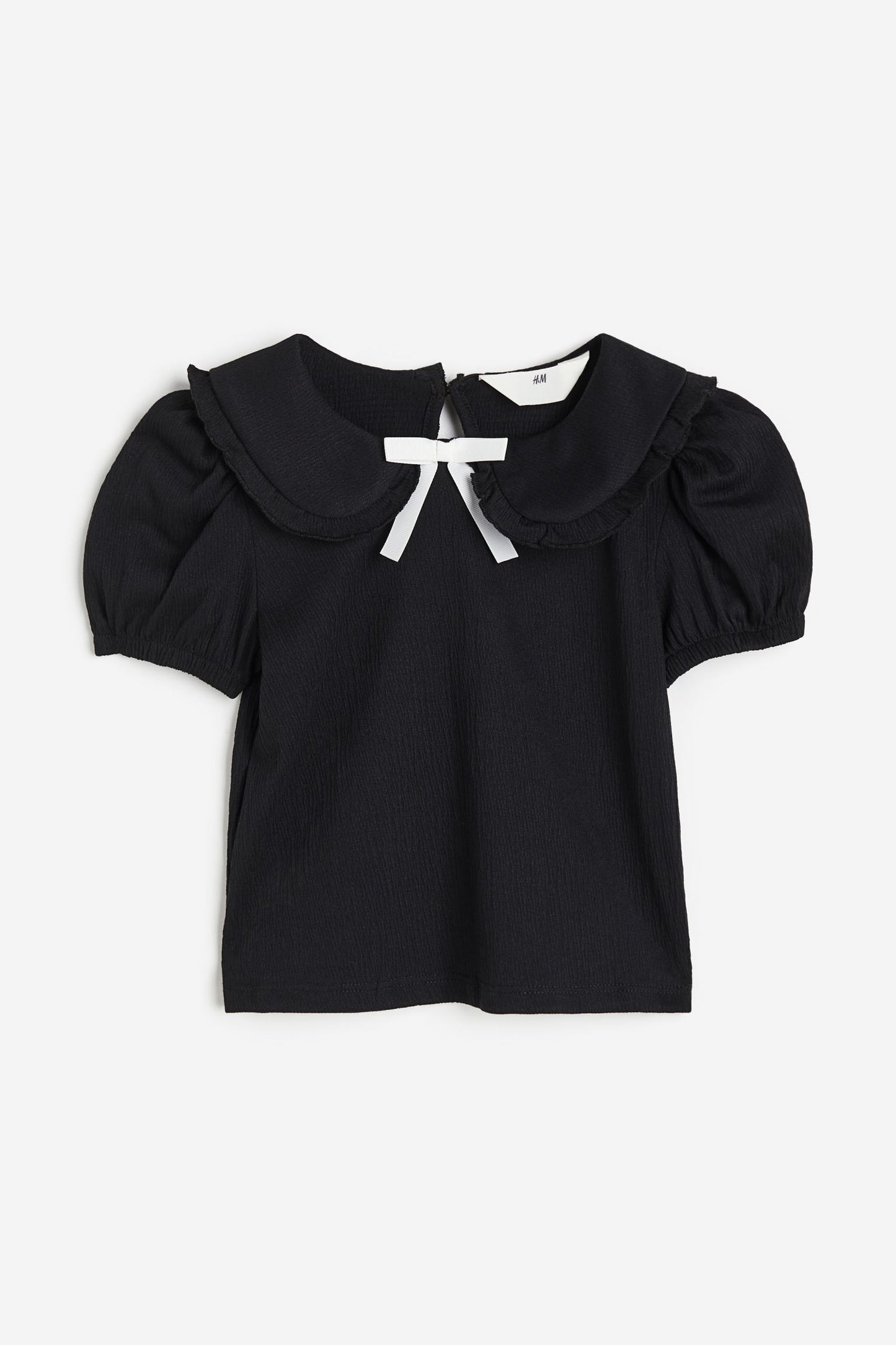 Camisa negra h&m niña coello chongo