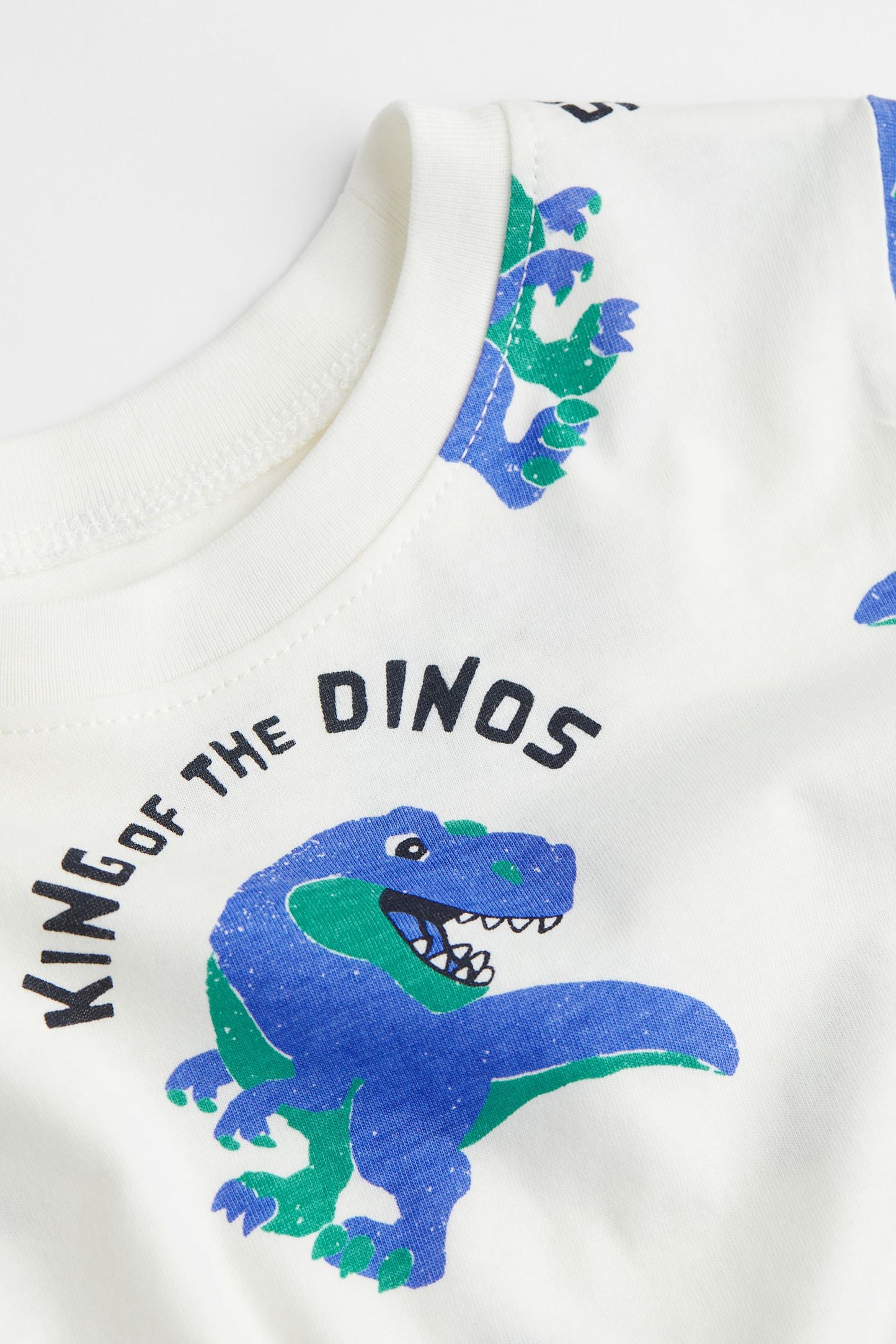 Camisa H&M niño dinosaurios azules