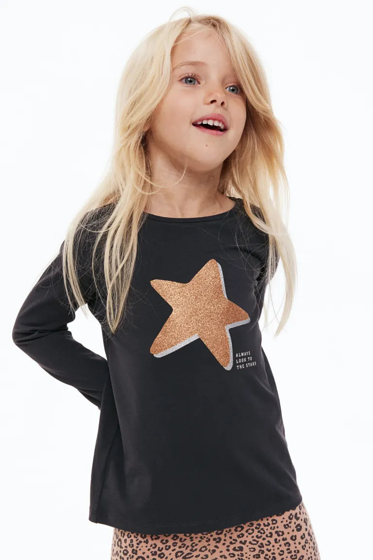 Camisa niña H&M negra estrella manga larga