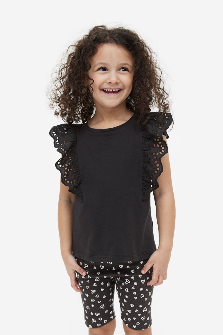 Camisa negra niña H&M revuelos blonda blusa