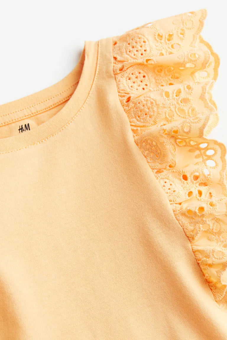 Camisa amarilla niña H&M revuelos blonda eyelet