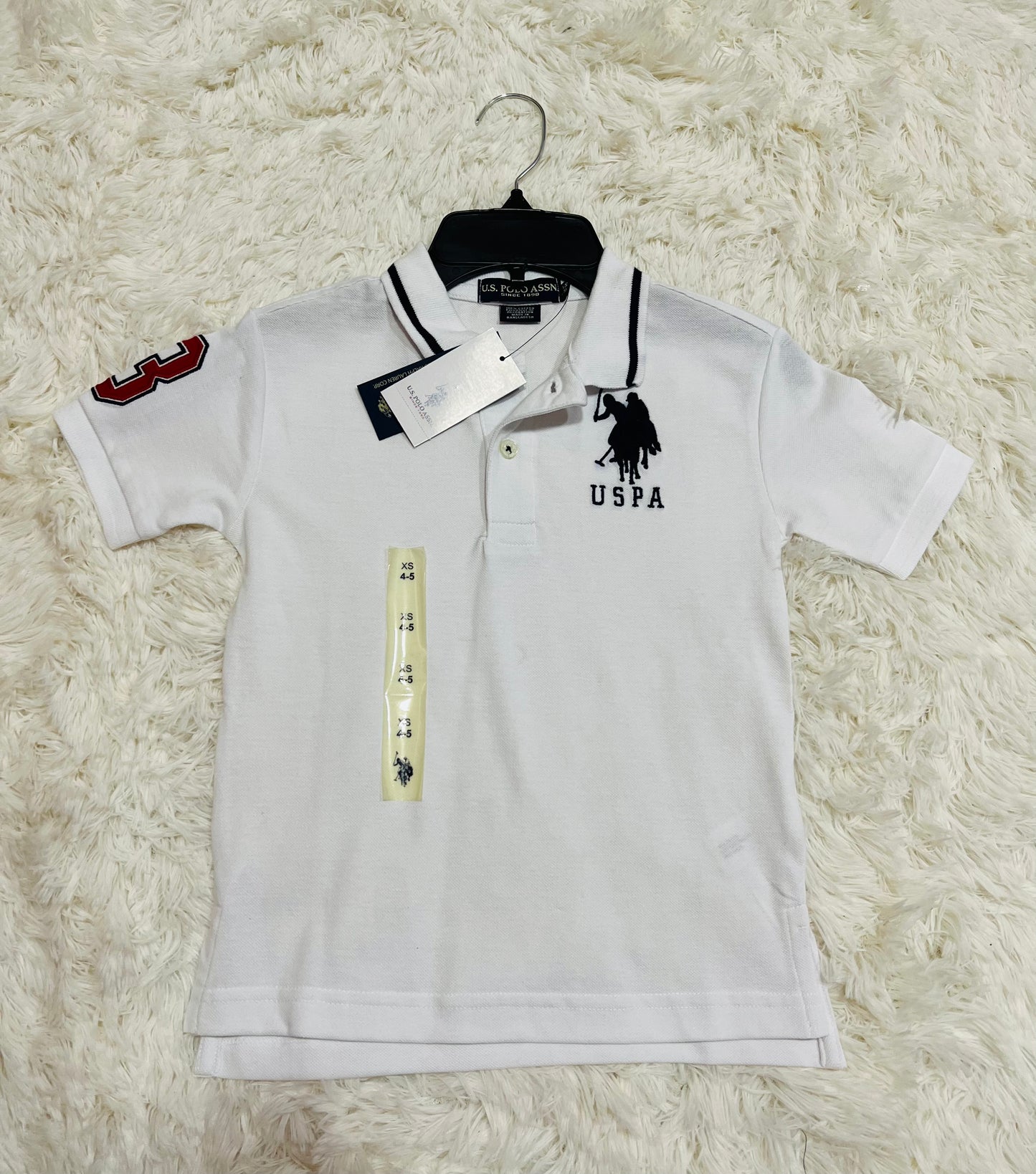 Camisa Polo blanca Niño manga 3